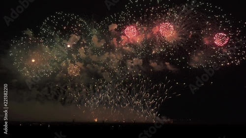 Colorful fireworks on black sky background stock footage video