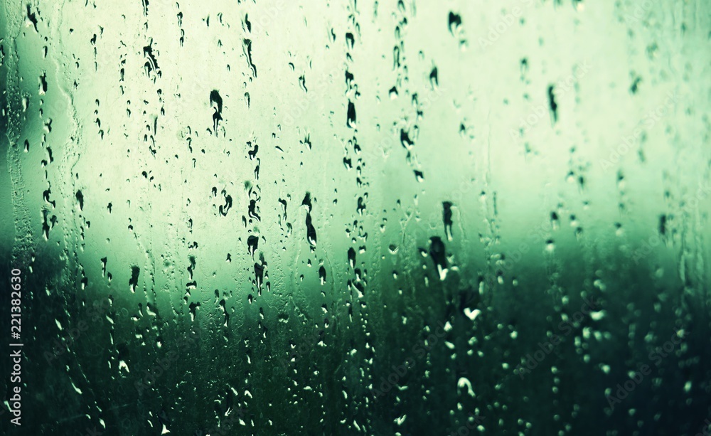 Raindrops on window in fresh morning blur background Raindrops on window in fresh morning blur background