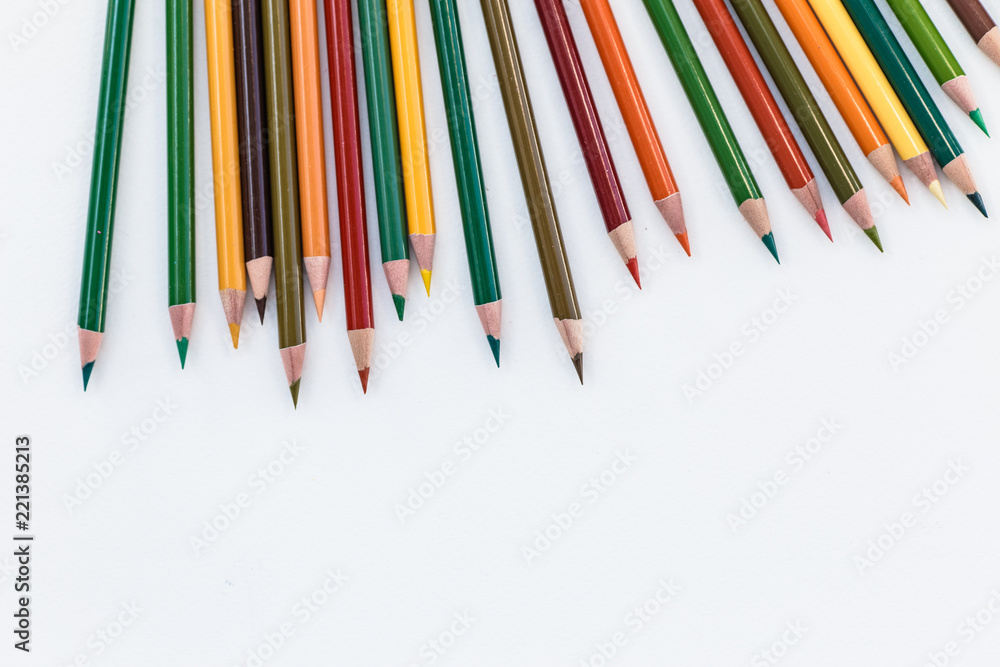 Set of colorful pencils on white background. Autumn color palette Back to school concept. Copy space for text Set of colorful pencils on white background. Autumn color palette Back to school concept. Copy space for text