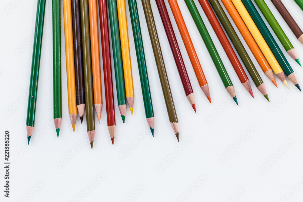 Set of colorful pencils on white background. Autumn color palette Back to school concept. Copy space for text Set of colorful pencils on white background. Autumn color palette Back to school concept. Copy space for text