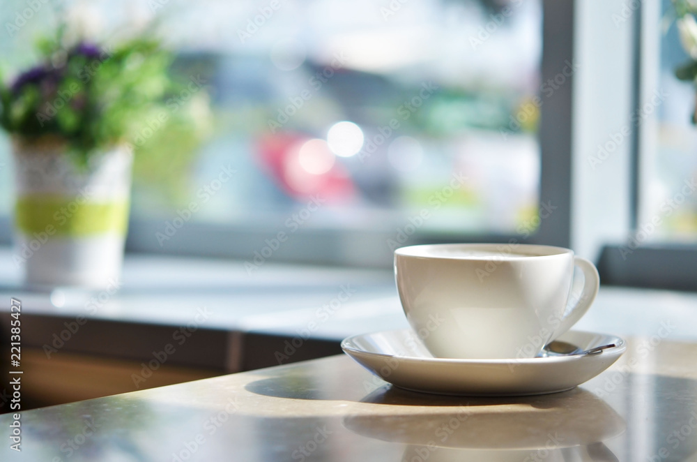 Сup of coffee on table in cafe ,Morning light.