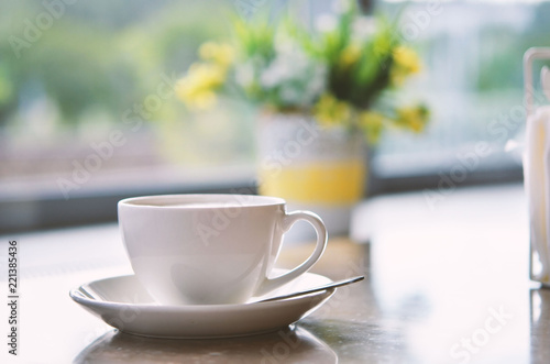 Сup of coffee on table in cafe ,Morning light.