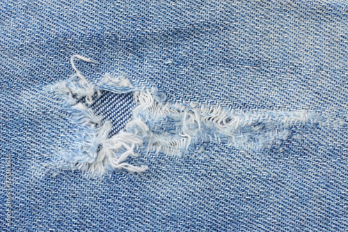 Картината върху платно Denim jeans texture or denim jeans background with old torn