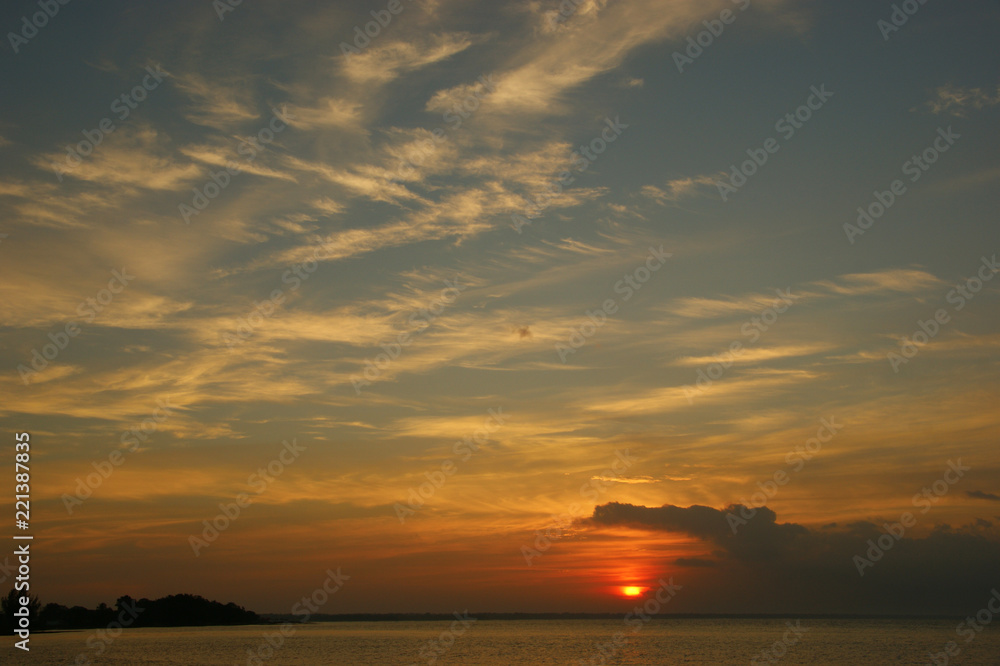 clouds at sunset. Playa Larga Cuba. bay of pigs. sunset on the caribbean sea