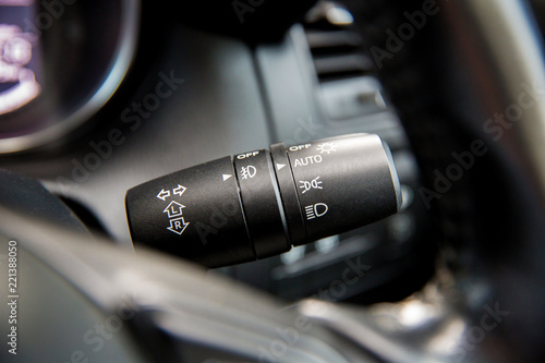 Car interior with light switch.the light knob in the car. Multifunction Headlight Console Control Switch Knob