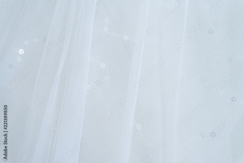 Close-up of white wedding dress Close-up of white wedding dress