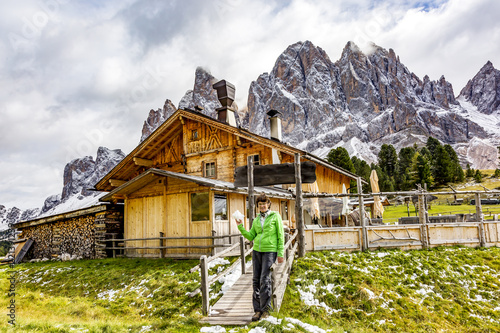 Woman hiking in the nature park Geisler-Puez in South Tyrol photo