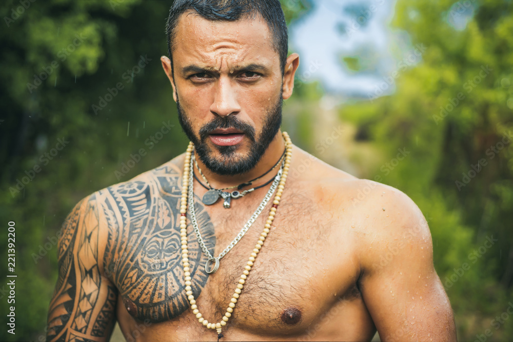 Brutal handsome man with tattooed body. Men tattoo casual fashion. Portrait  of brutal handsome male model outdoor. Muscular athletic sexy male with  naked torso Stock Photo | Adobe Stock