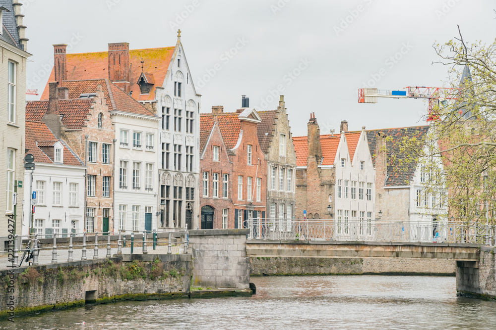 Beautiful street view with bridge and river of the Brugge city