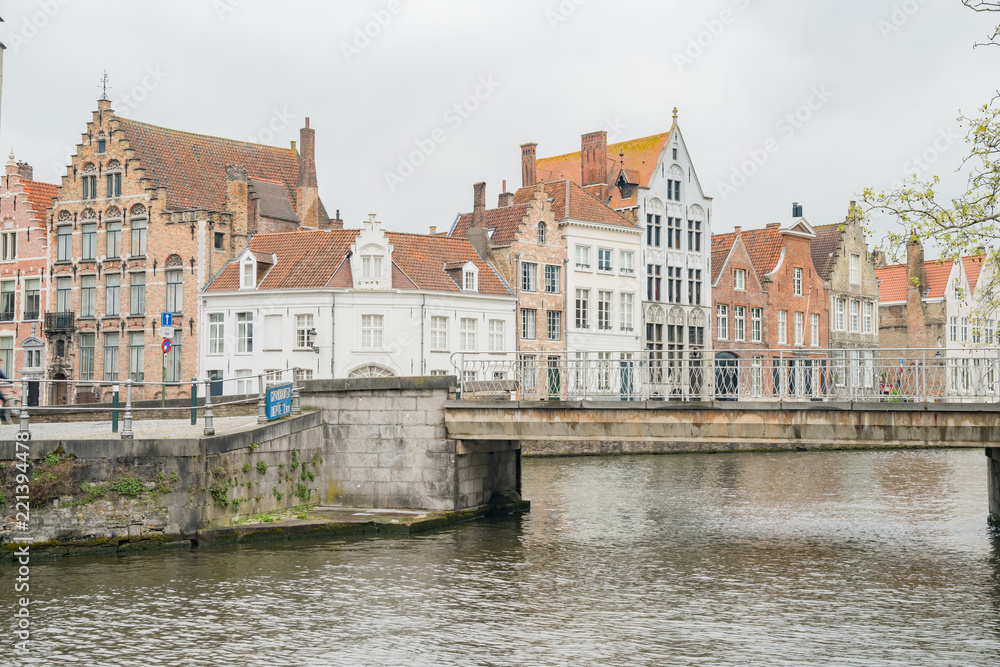 Beautiful street view with bridge and river of the Brugge city