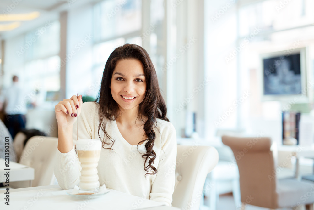 Beautiful woman drinking coffee Beautiful woman drinking coffee