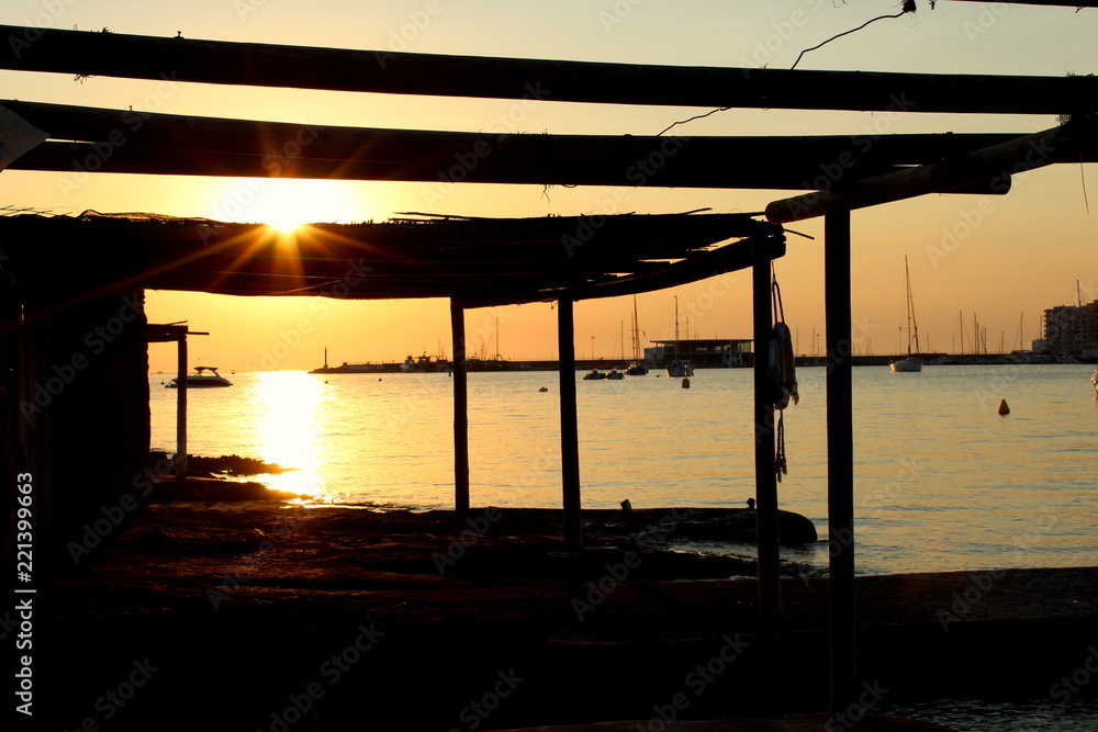 Beautiful sunset in fishing shack in San Antony de Portmany, Ibiza