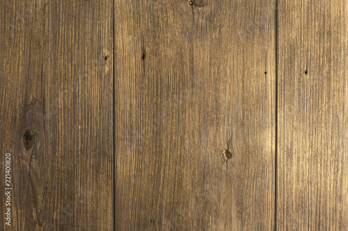 Background with a texture and a pattern from the boards of a natural rustic tree of brown color. Surface of table  wall or floor