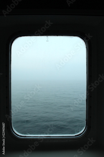 Ship cabin window view: northern sea © laura