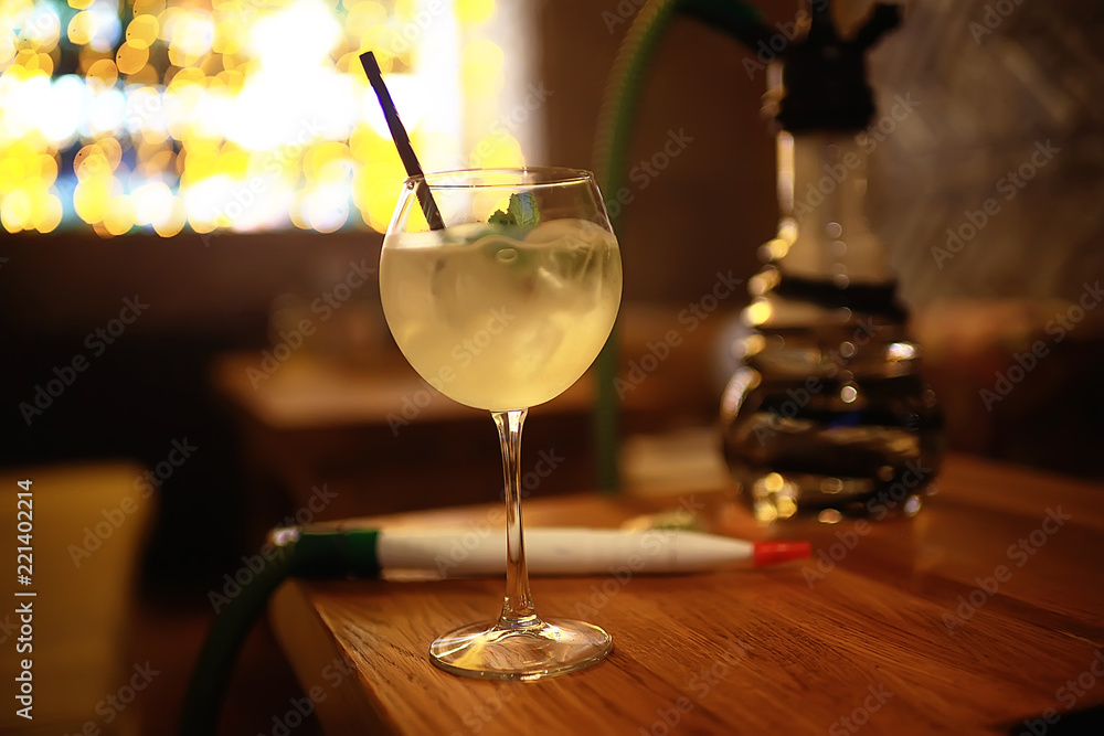 cocktail in a modern restaurant / glass with a bright cocktail in the fashionable interior serving in the restaurant, nightclub cocktail in a modern restaurant / glass with a bright cocktail in the fashionable interior serving in the restaurant, nightclub