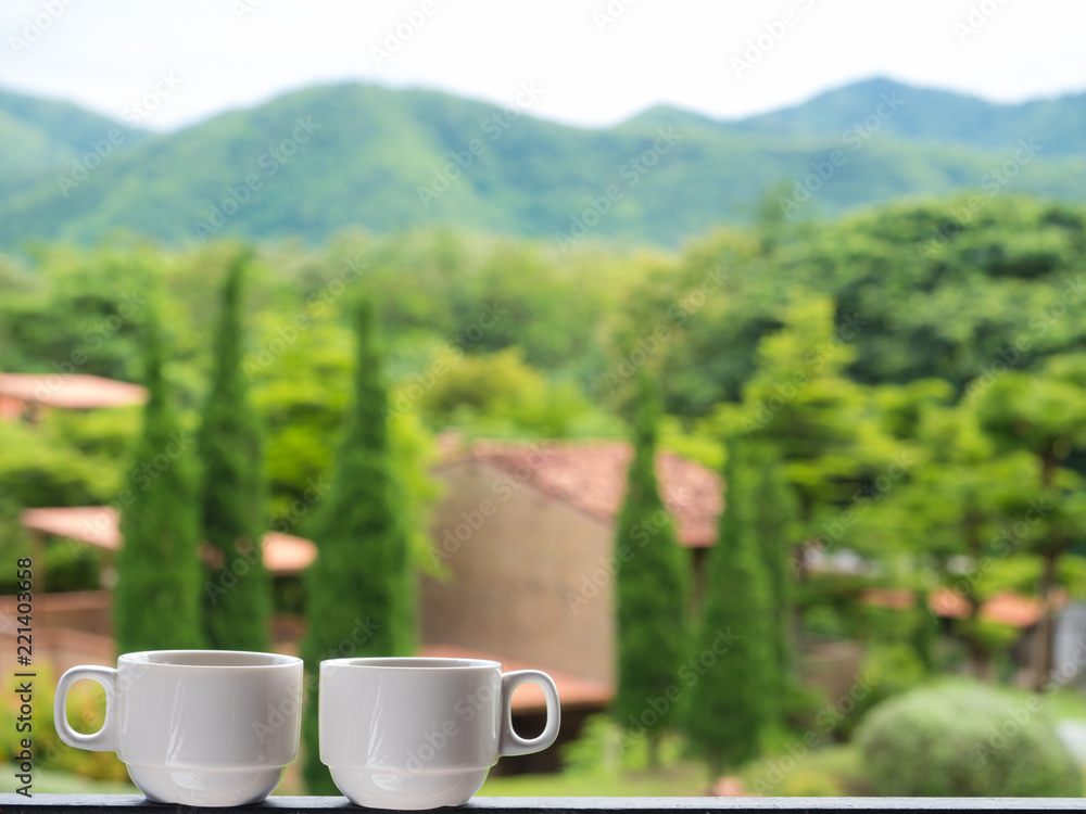 couple cup of coffee with mountains landscape.  Beauty nature background, copy space, relax time