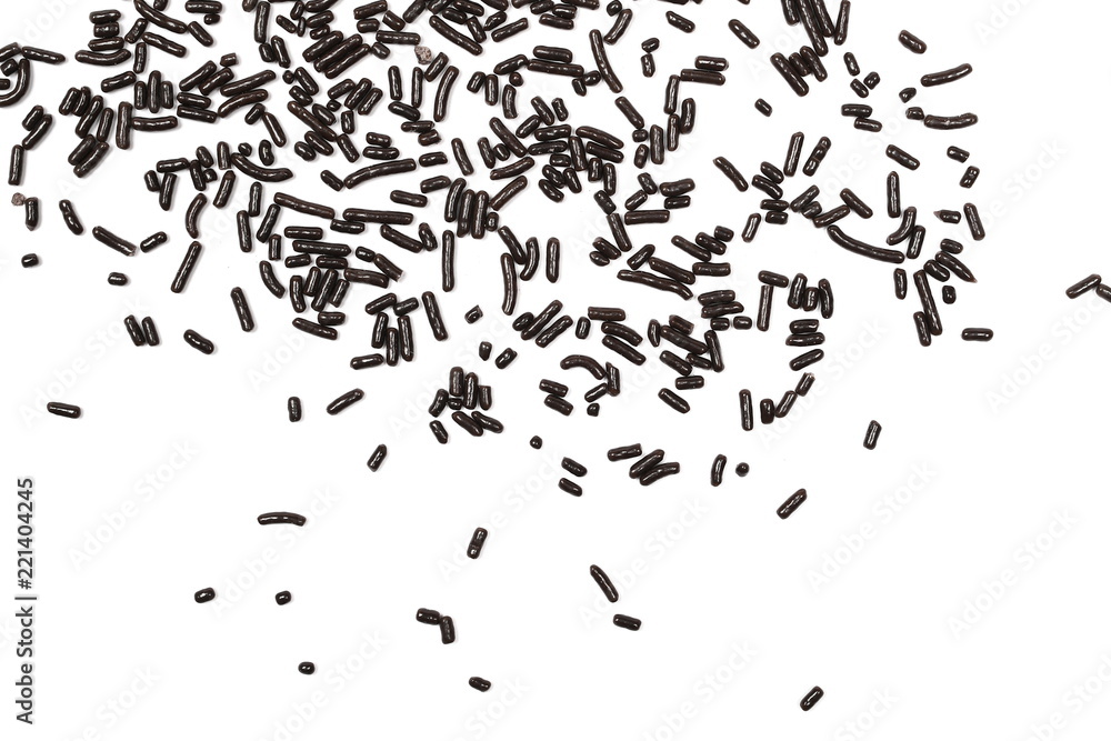 Decorative chocolate sprinkles, granules for cakes and pastries isolated on white background and texture, top view Decorative chocolate sprinkles, granules for cakes and pastries isolated on white background and texture, top view