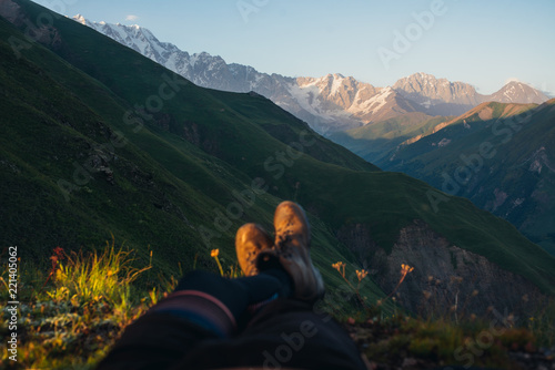 legs at mountain top