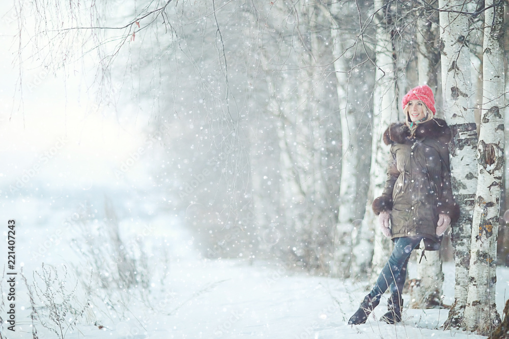 smiling young woman winter cold day nature