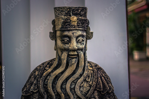 Bangkok - October 13, 2014: Statue of an ancient wiseman in the Buddhist Wat Pho temple in central Bangkok, Thailand
