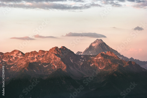 Sunset Caucasus Mountains range peaks and clouds Landscape Summer Travel wild nature scenic awesome view