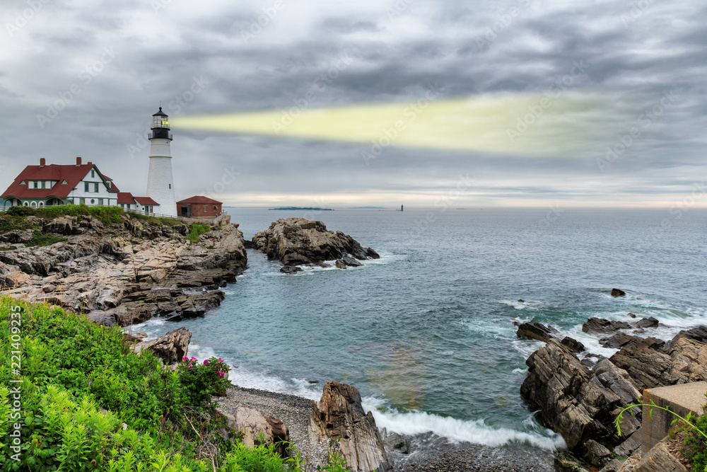 Light beam of Portland Lighthouse in Cape Elizabeth, Maine, USA.