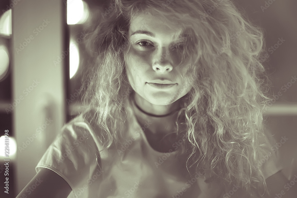 blonde with curly hair / beautiful girl model with long curly hair, natural beauty concept blonde with curly hair / beautiful girl model with long curly hair, natural beauty concept