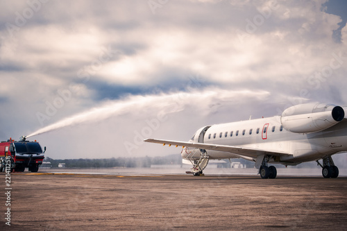 Emergency Services Training Institute fire truck fights a burning plane,fireman water injection in the airport.