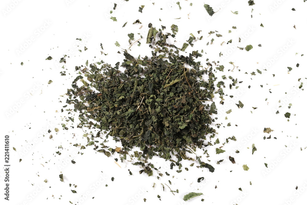 Dry, cut and sliced nettle pile, isolated on white background, top view Dry, cut and sliced nettle pile, isolated on white background, top view
