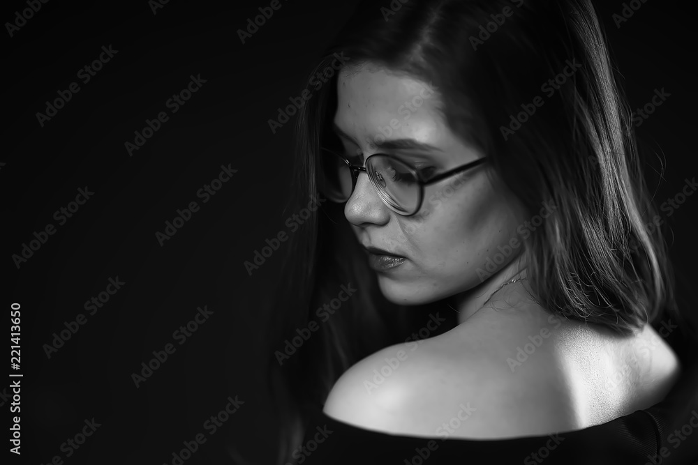 Naklejka premium serious young woman with glasses / businesswoman serious look in glasses. concept vision business, youth