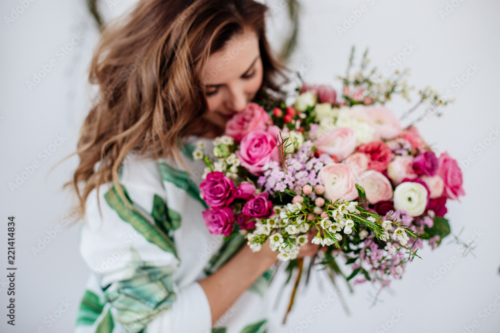 Florist makes a bouquet.