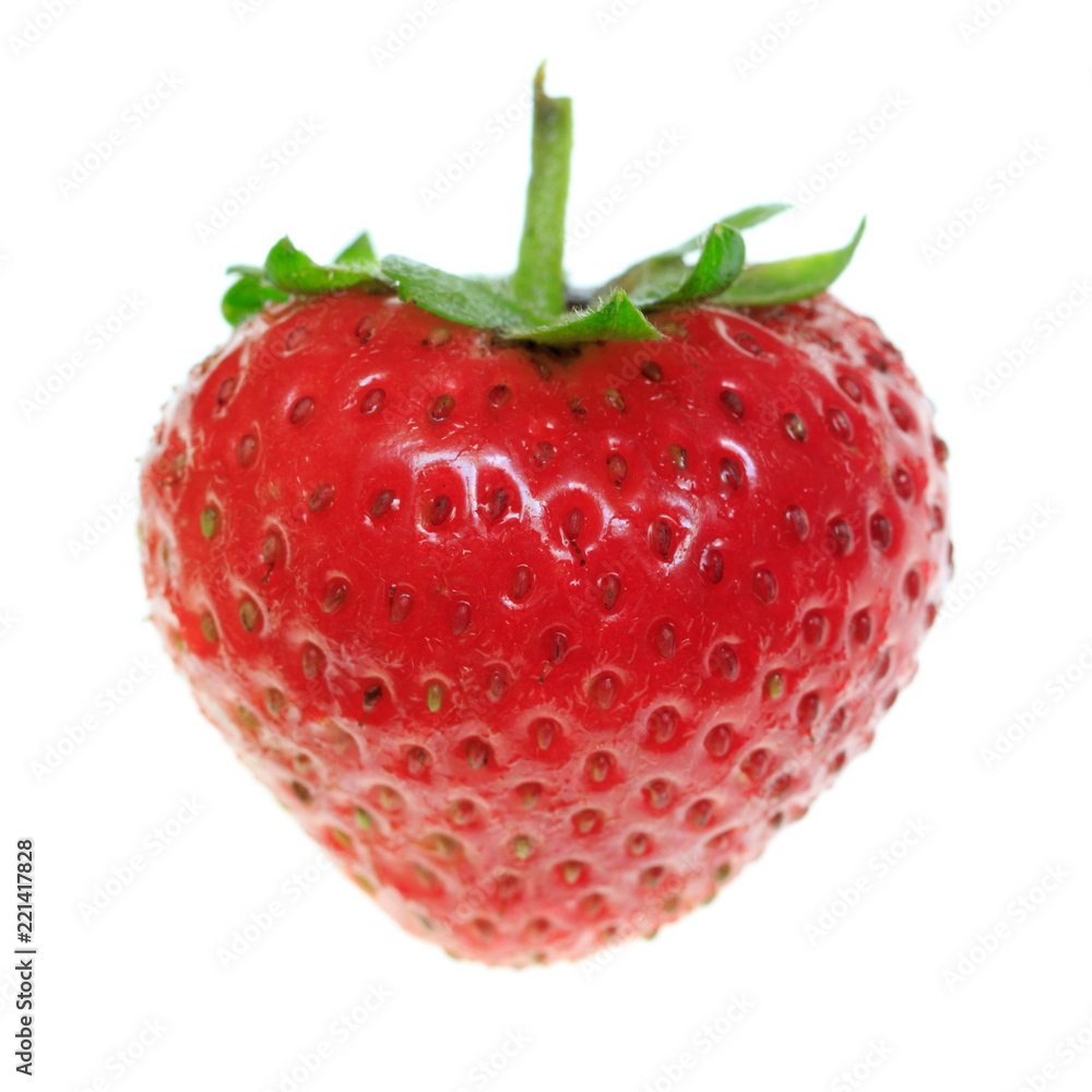 One ripe strawberry on a white background One ripe strawberry on a white background