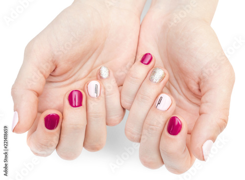 Woman s hands with beautiful manicure on white.