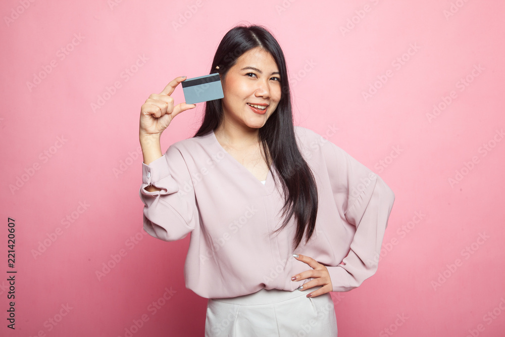 Young Asian woman smile with blank card. Young Asian woman smile with blank card.