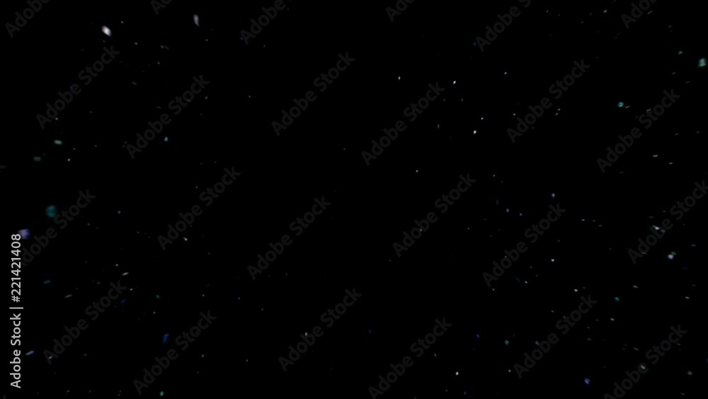 Floating particles on black background. Slow motion.
Floating particles on black background. Slow motion.