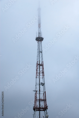 TV Tower in fog. Foggy morning in Lviv, Western Ukraine. Cold and wet spring weather.