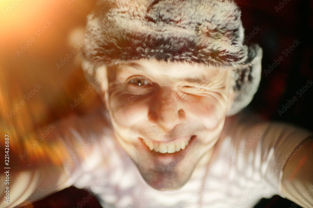 Fototapeta premium cheerful happy man portrait, young guy laughs, man looks at the frame, smile on the man's face, cheerful european