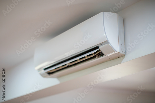 Photos Close up of an Air Conditioner on a white wall