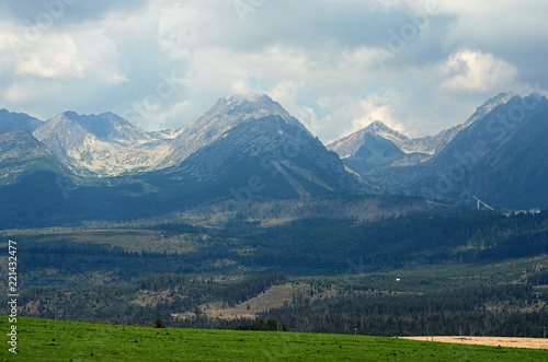 Beautiful landscape view of the High Tatra Mountains range under cloudy sky. Slovakia