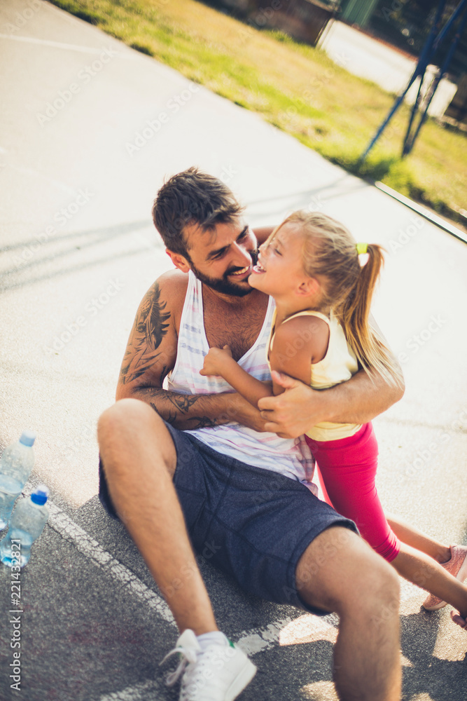 Happy father and daughter after sport activity. Happy father and daughter after sport activity.