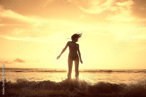 girl is having fun and jumping on beach freedom   concept freedom and summer  beach  sporty graceful girl is jumping and having fun  beach