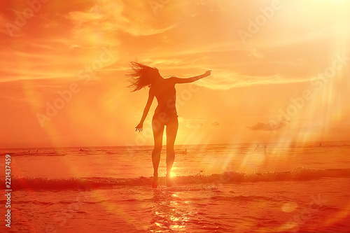 happy girl beach sea   girl in summer on the beach freedom wind wet hair  concept of summer vacation young beautiful girl
