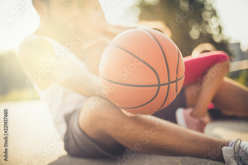 Basketball family. Focus on ball. © liderina