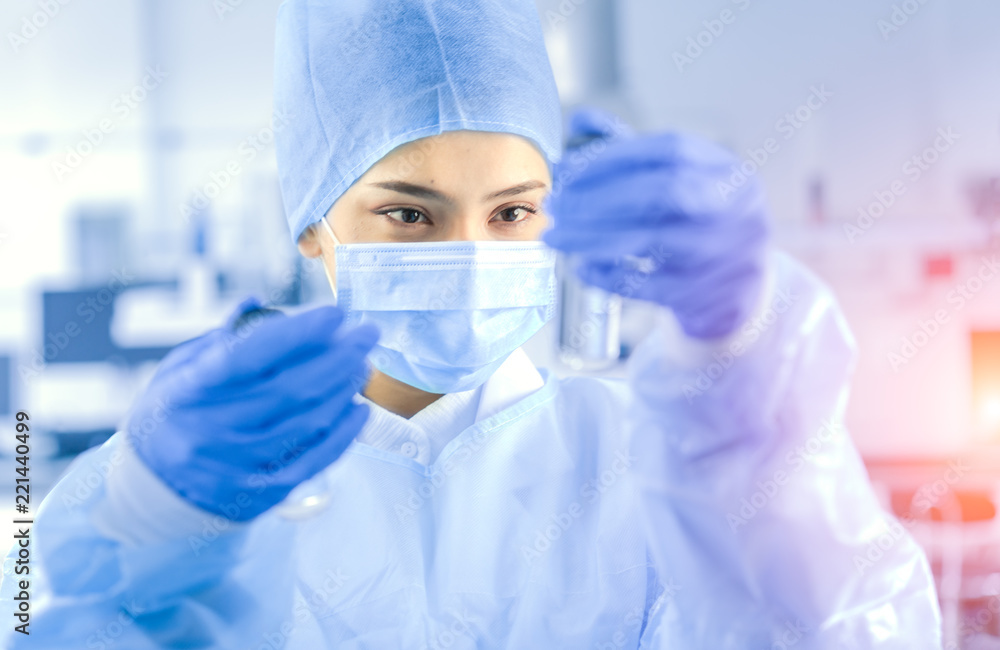 Female scientist working in the laboratory Female scientist working in the laboratory