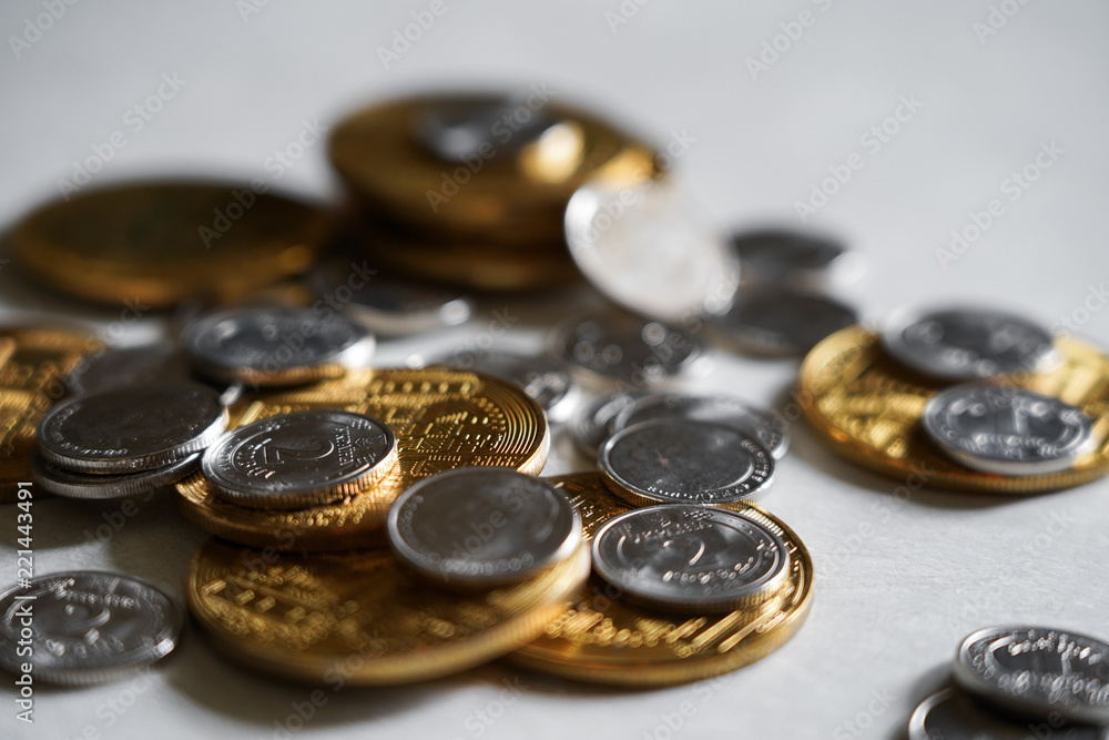 Macro shot detail of golden and silver color coin stacks on dark background with copy space for text. Business and finance growth, saving money, investment and interest concept. Macro shot detail of golden and silver color coin stacks on dark background with copy space for text. Business and finance growth, saving money, investment and interest concept.