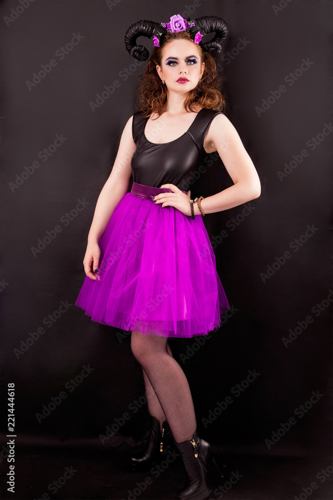 A model a skirt-tutu with horns. Halloween A model a skirt-tutu with horns. Halloween