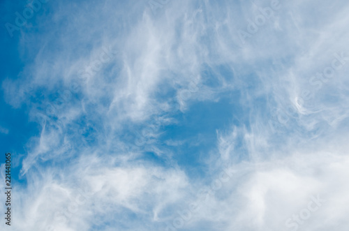 Textured background of blue sky with clouds photo