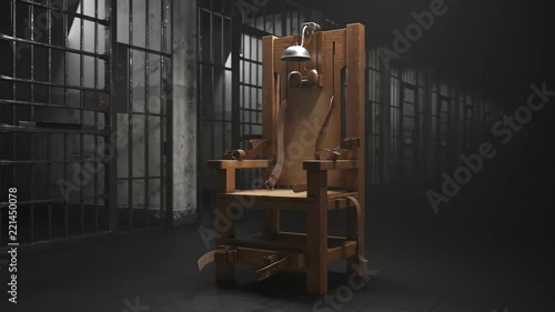 Wooden electric chair in the spotlight in a prison block. Vertigo shot. 4K HD photo