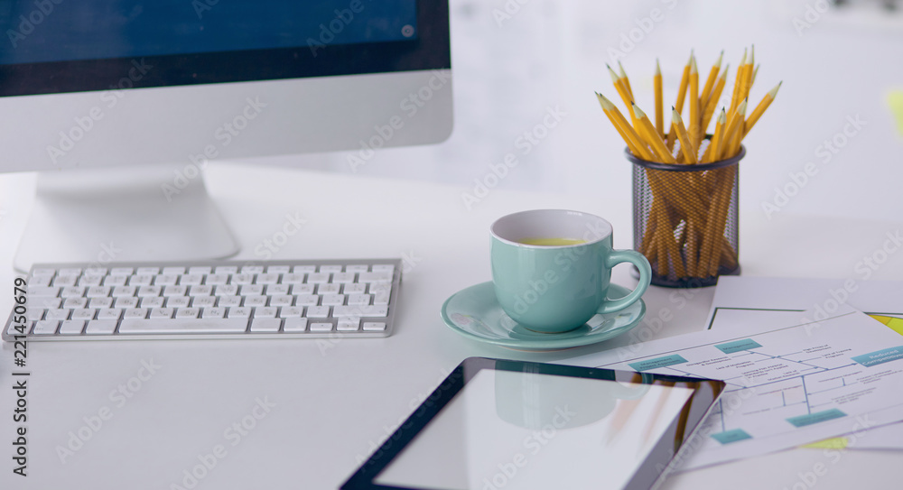 A cup of coffee on the office table A cup of coffee on the office table