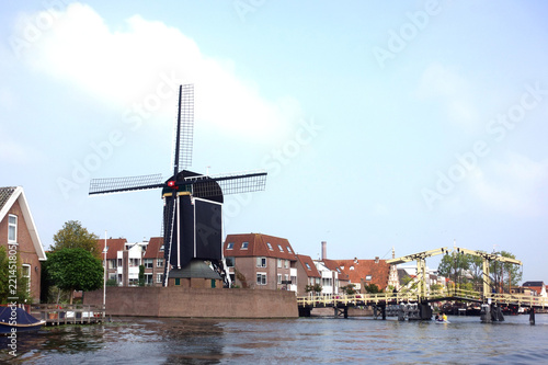 Rembrandt bridge and windmill De Put in Leiden photo